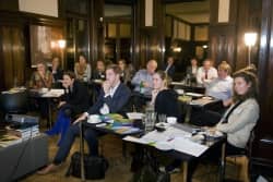Het publiek bij het seminar over financiële prikkels